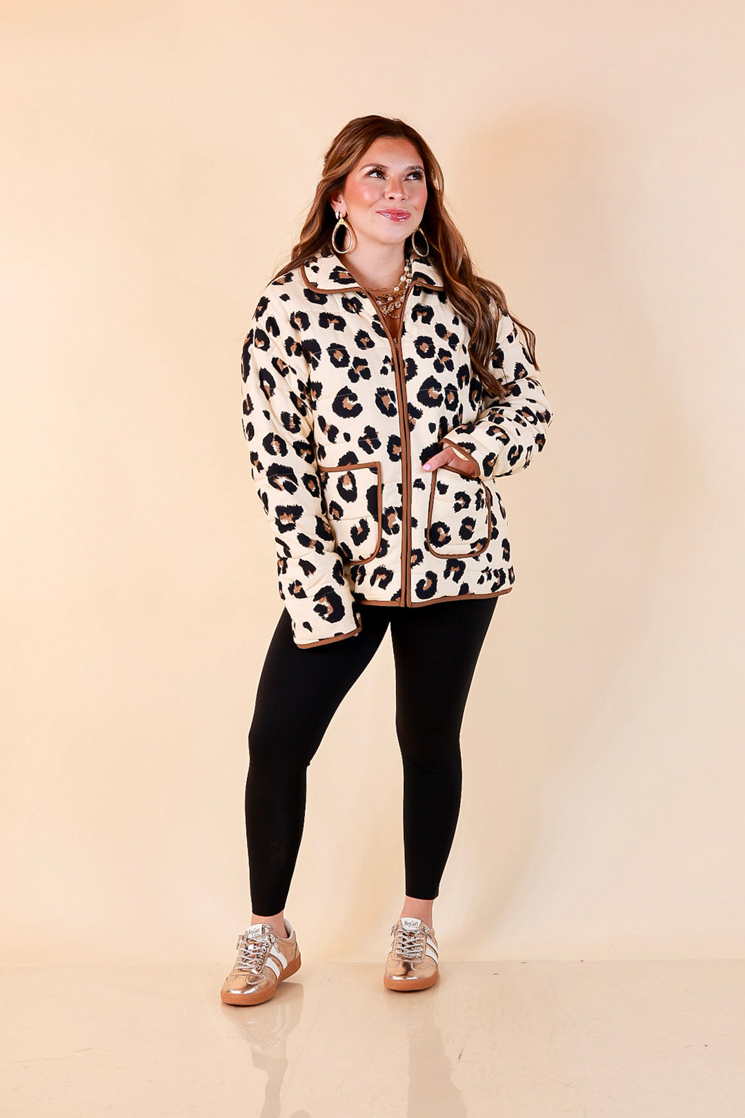 Into the Wild leopard print quilted jacket with brown piping in ivory