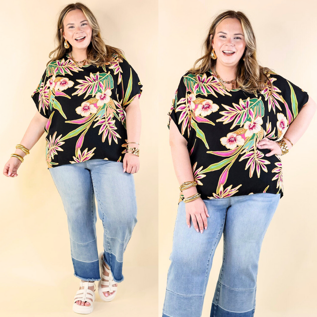 Elevate your style with our Island Oasis Top, a vibrant blend of tropical flair and effortless chic. With its short sleeves, captivating floral print, and flattering high-low hemline, this lightweight piece is your go-to for sunny adventures. Available in sizes small to 3XL, it ensures comfort and flair for all body types, perfect for embracing the warmth of spring and summer in style.