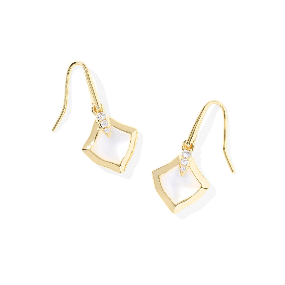 A solid white background with kendra scott Joelle small drop earrings in gold and ivory mother-of-pearl