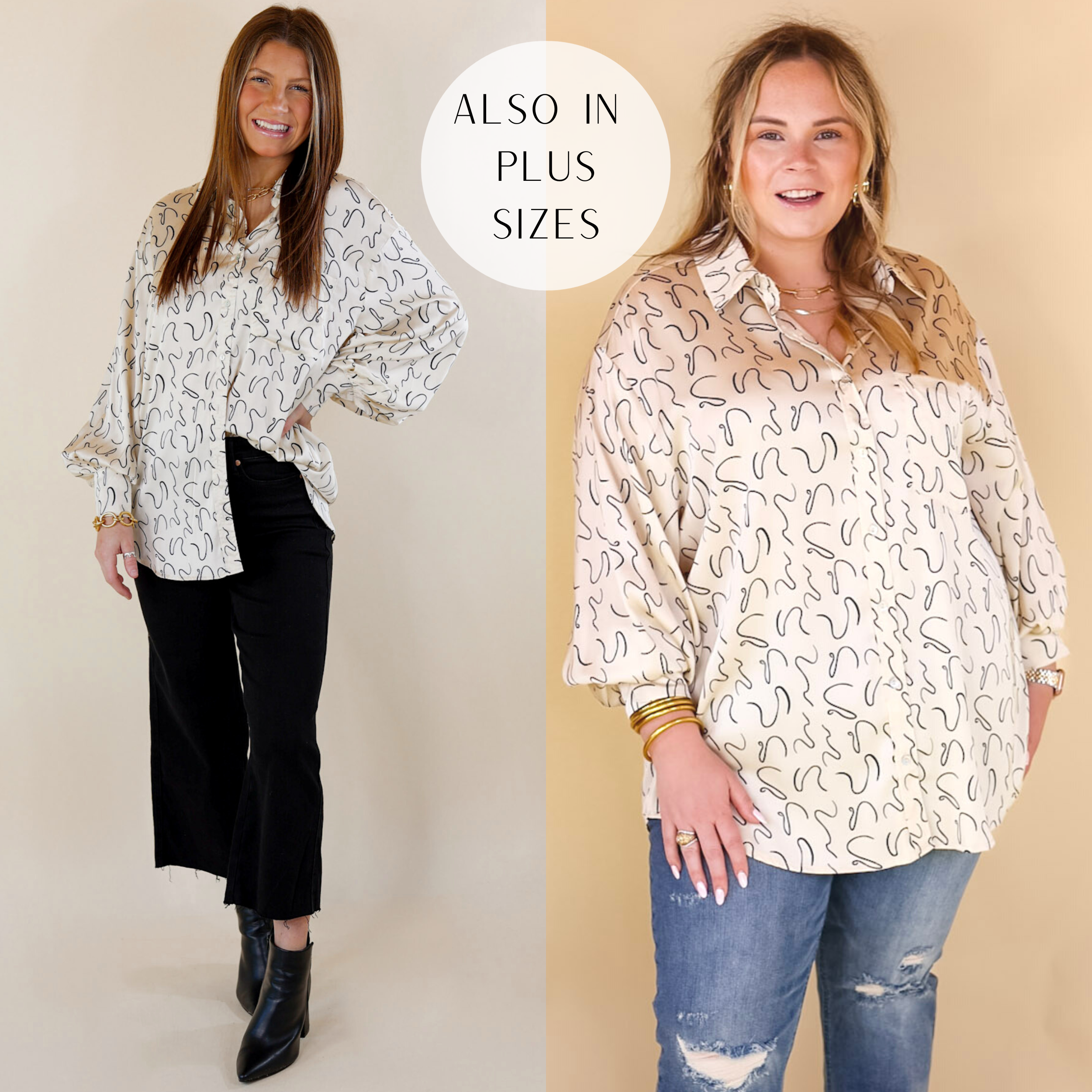 Model is wearing a satin button up top with long sleeves, a collared neckline, and a black swirl print. Model has this top paired with distressed jeans, tan wedges, and gold jewelry.