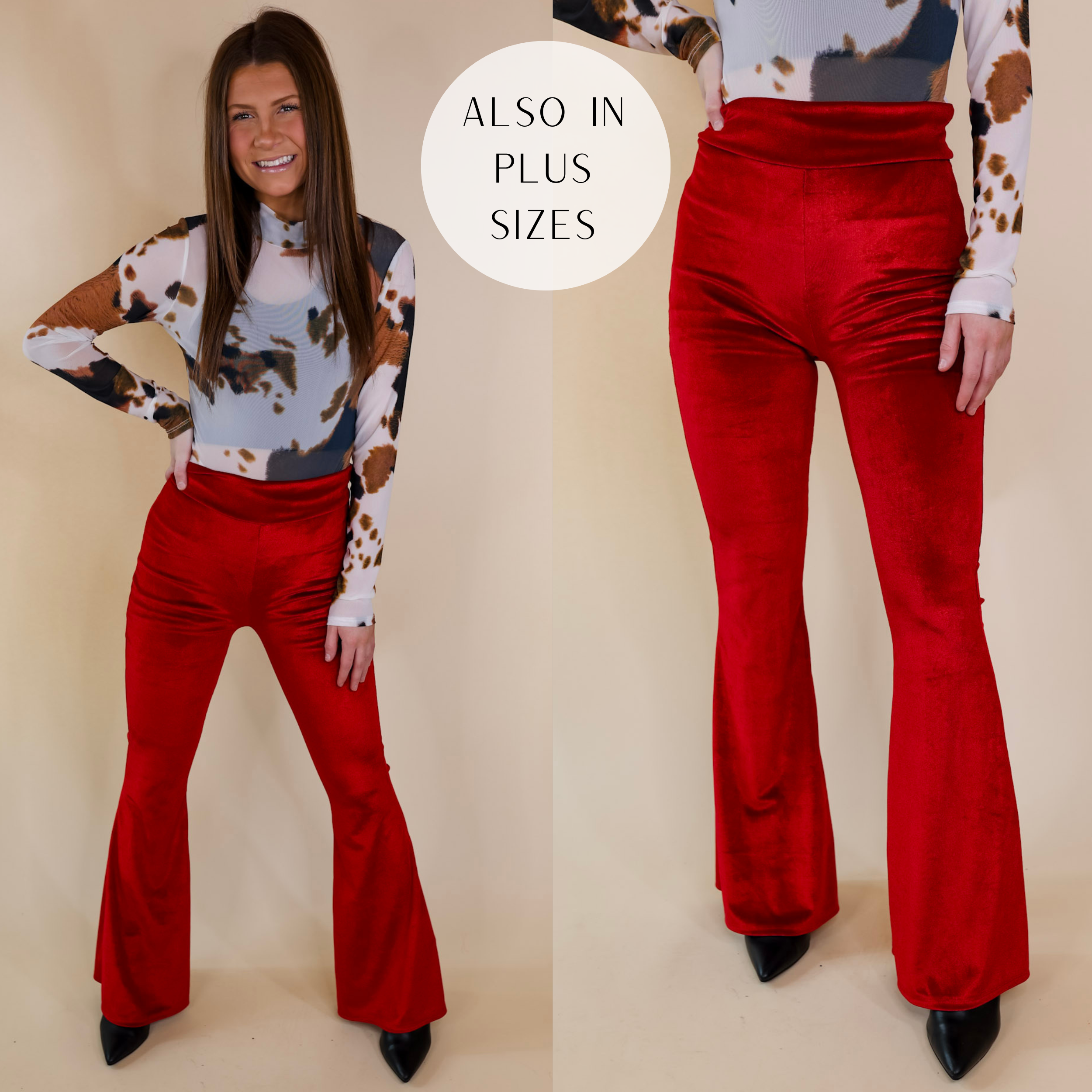 Model is wearing a pair of velvet bell bottom pants with a high waistline. Model has these red pants paired with a cow print bodysuit and black booties.