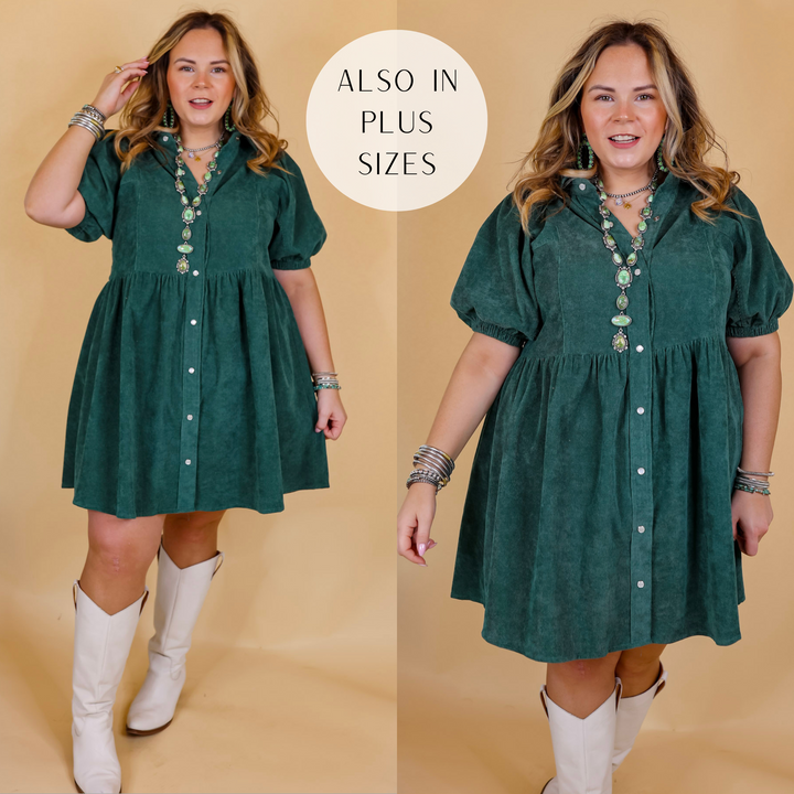 Model is wearing a corduroy babydoll dress in a dusty teal. Model has this dress paired with tall white boots and Navajo jewelry. Background is solid tan. 