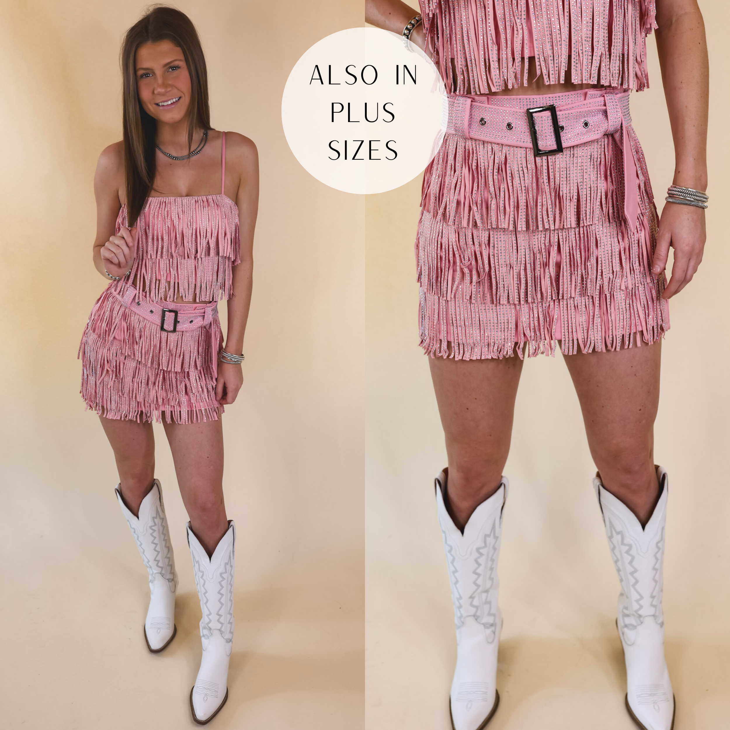 Model is wearing a crystal fringe skort with a matching top in light pink. Model has this set paired with white boots and Navajo jewelry. Background is solid tan.