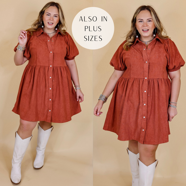 Model is wearing a button down corduroy babydoll dress in terracotta. Model has this dress paired with tall white boots and Navajo jewelry. Background is solid tan.