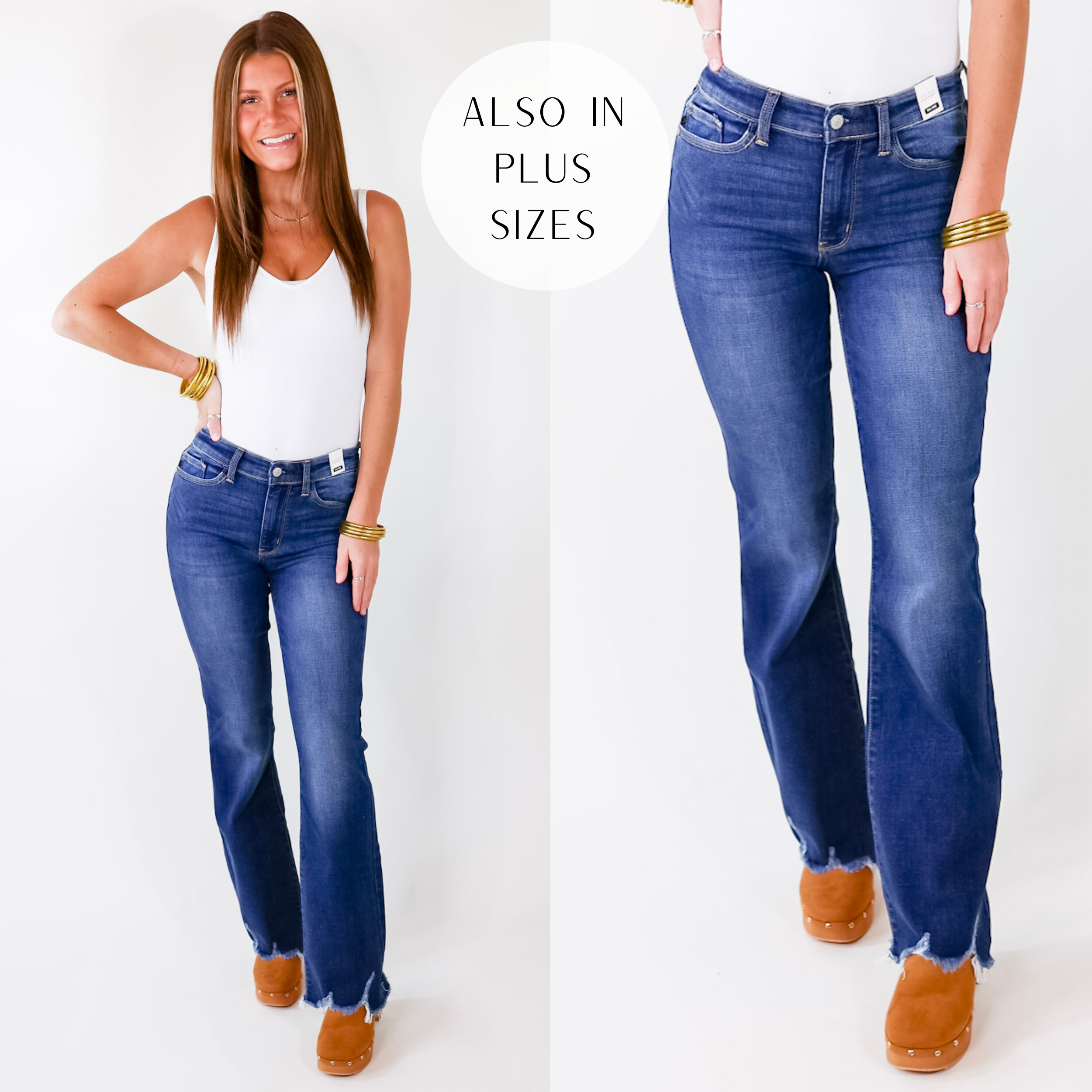 Model is wearing a pair of dark wash bootcut jeans with a raw hem. Model has these jeans paired with a white tank top, gold jewelry. and tan slip on wedges.