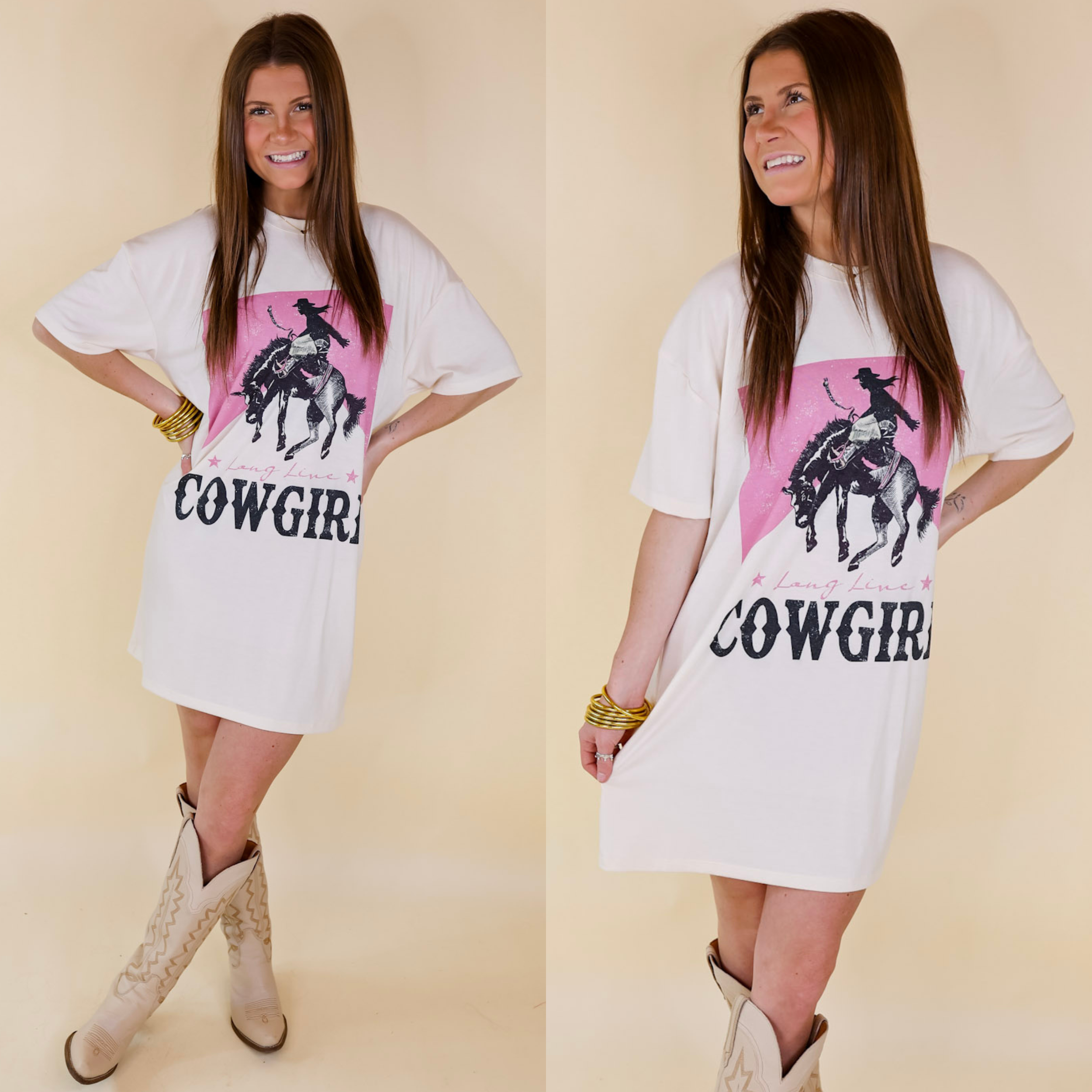 Model is wearing a short sleeve tee shirt dress with a pink graphic that says "Long Live Cowgirl" in black script. Model has this short dress paired with gold jewelry and nude cowboy boots.