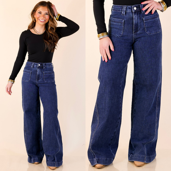 Model is wearing Front Patch Pocket Retro Wide Leg Trouser Jean in Dark Wash with a plain background