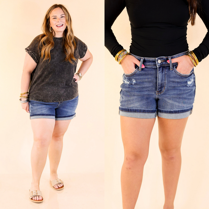 Dark wash, distressed details, and a hidden phone pocket make these dad shorts effortlessly cool and totally practical. Finished with a faux selvedge cuff for a polished touch. Available In Small through Plus sizes. 