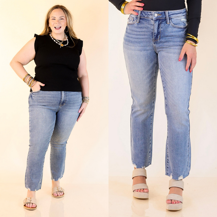 Models wearing light wash jeans on a beige background.