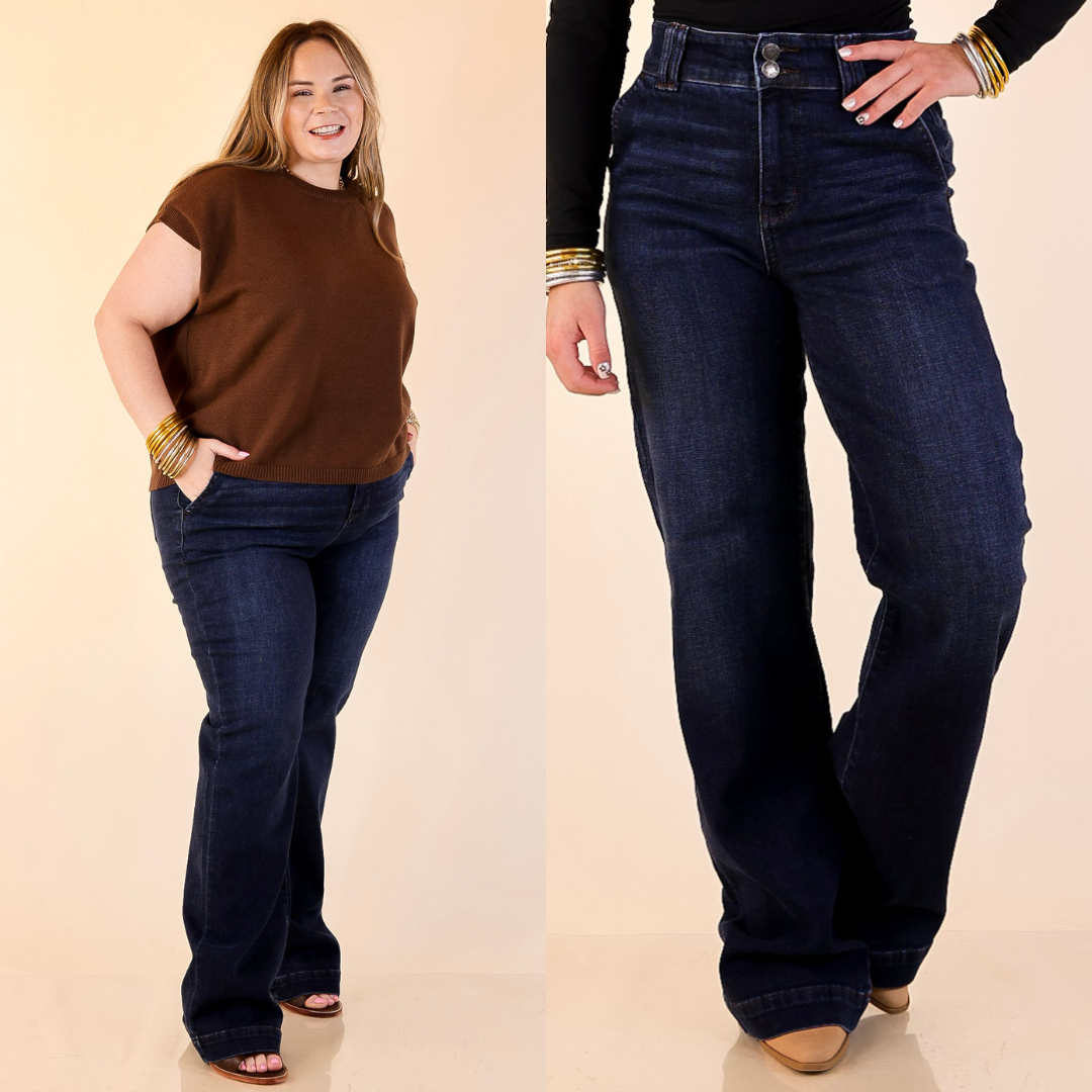 Model is wearing Wide Leg Trouser Jean in Dark Wash on a beige background