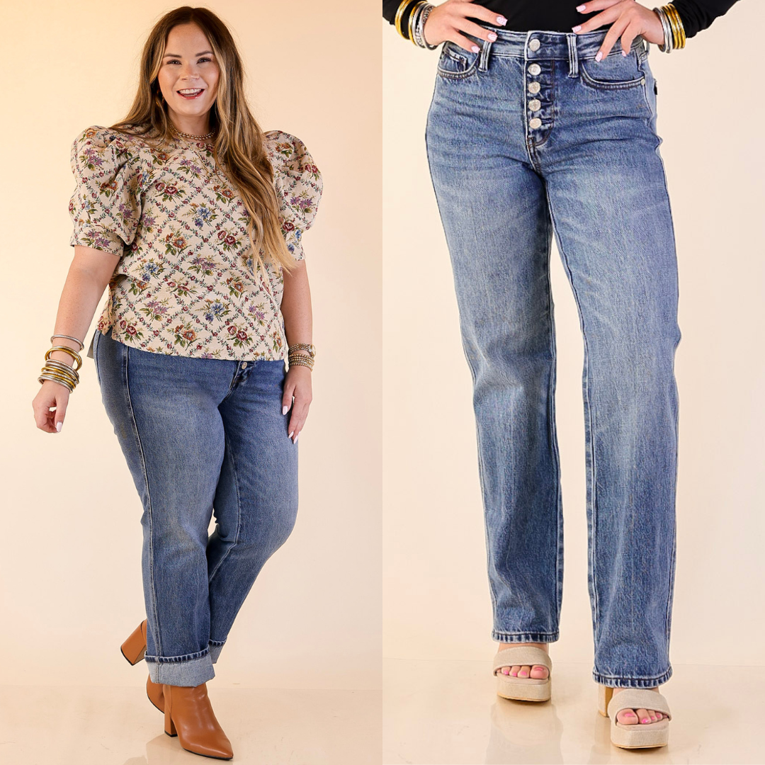 Women wearing rigid magic button fly slim straight jeans in medium wash. 