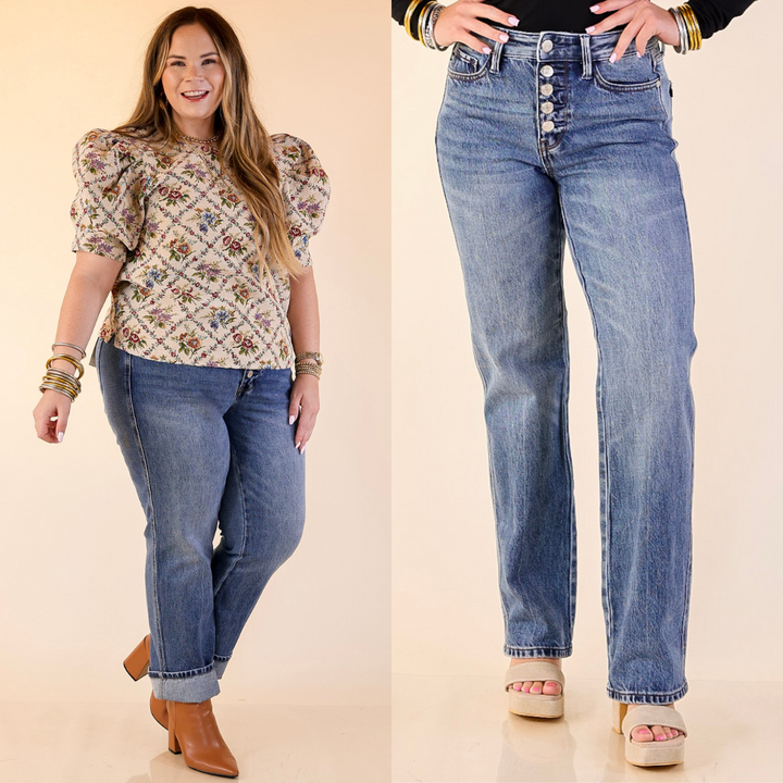 Women wearing rigid magic button fly slim straight jeans in medium wash. 