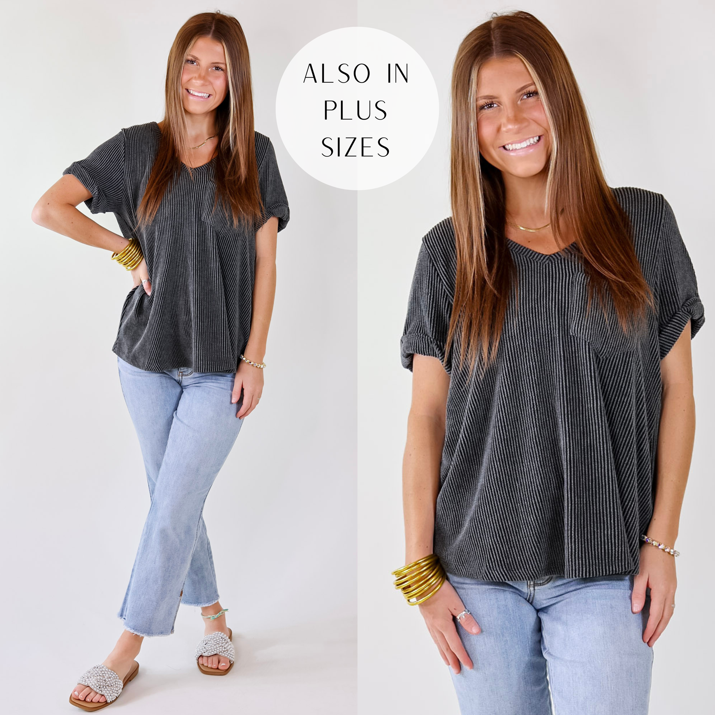 Model is wearing a charcoal grey short sleeve top featuring a ribbed fabric, cuffed sleeves, V neckline, and a front pocket.