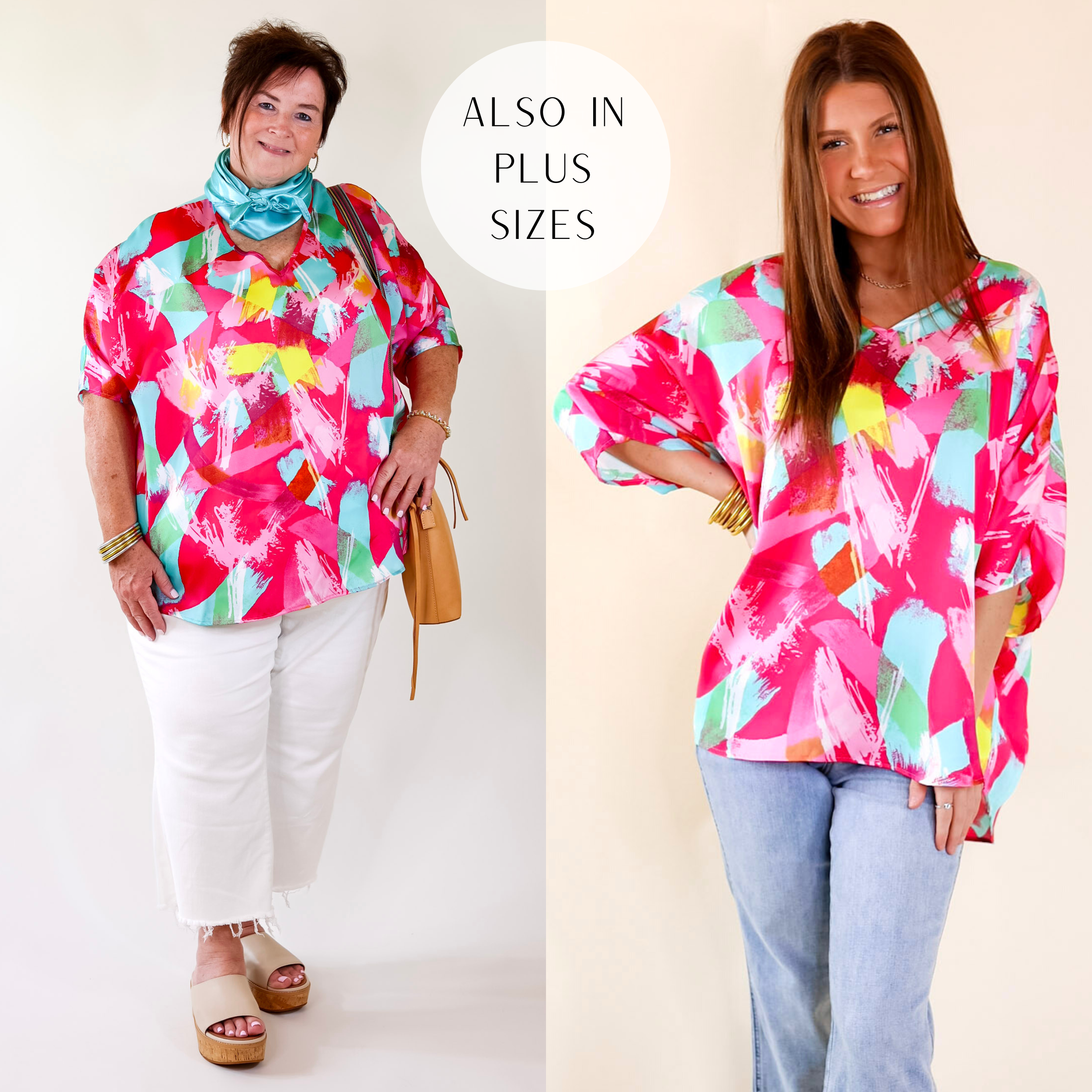 A pink poncho with blue, yellow, light pink, and dark pink brush strokes. Also features flowy 3/4 length sleeves, V neck collar, and an oversized fit. Item is pictured on a pale pink background.