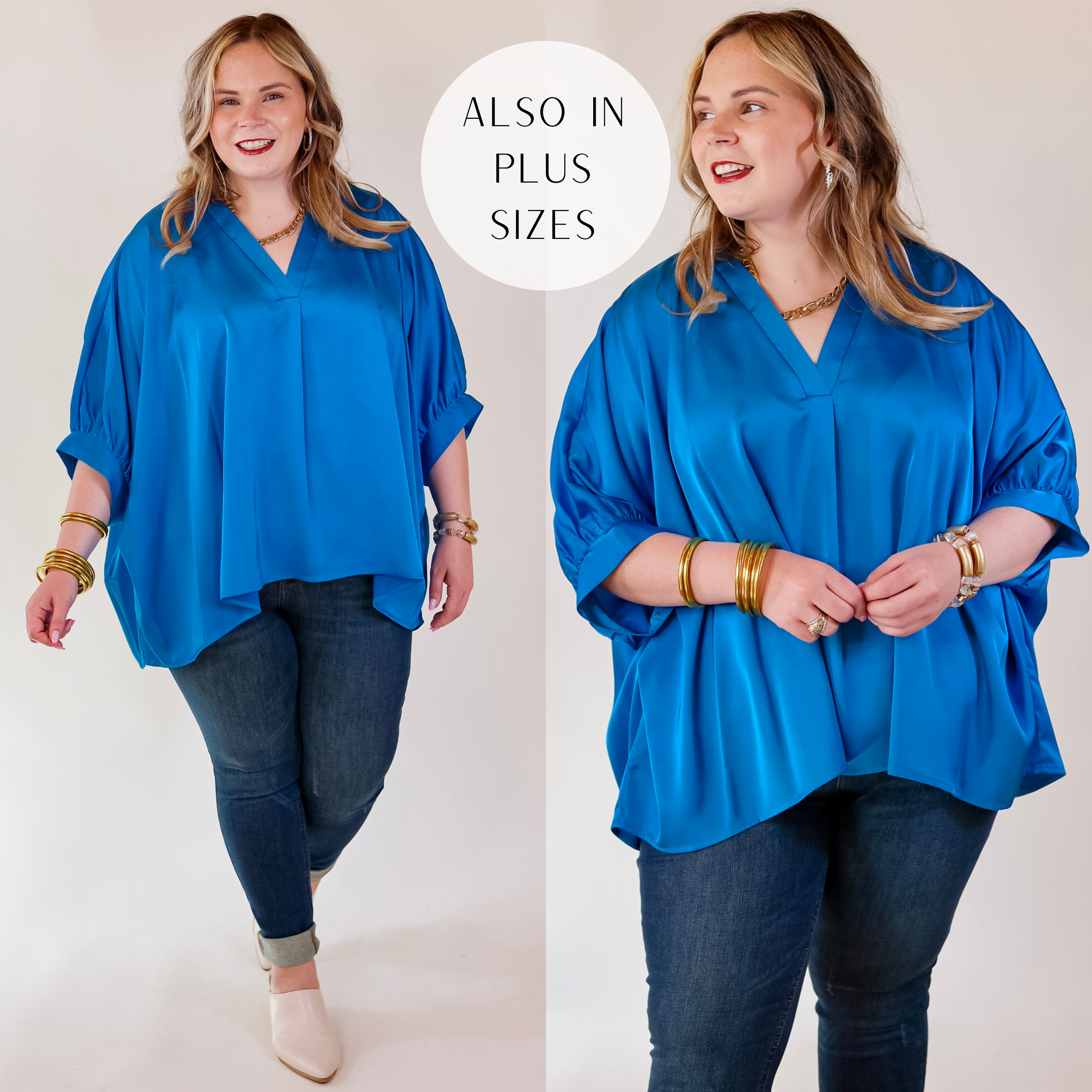 Model is wearing a flowy blue blouse featuring a v neckline, half sleeves, and cuffed sleeves