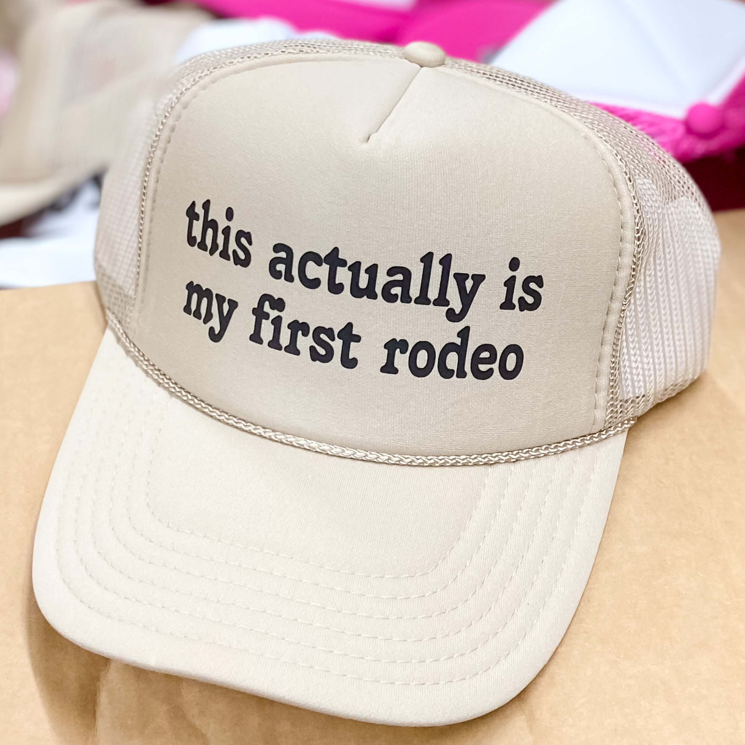 This Is Actually My First Rodeo Foam Trucker Hat in Tan - Giddy Up Glamour Boutique