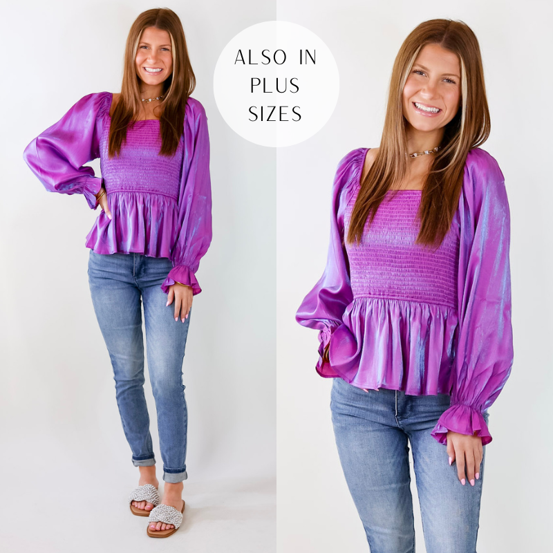Model is wearing a magenta purple mermaid top with a square neckline and ruffle hemmed long sleeves. Model has paired the top with skinny blue jeans, sandals, and gold tone jewelry. 