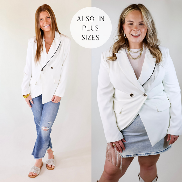 Model is wearing a white blazer featuring silver fringe across the front, grey and gold buttons, light shoulder padding, and a light weight fabric