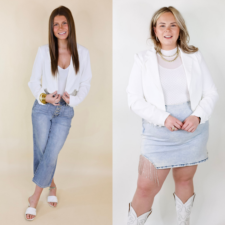 Model is wearing a white cropped blazer with crystal fringe around the hem.