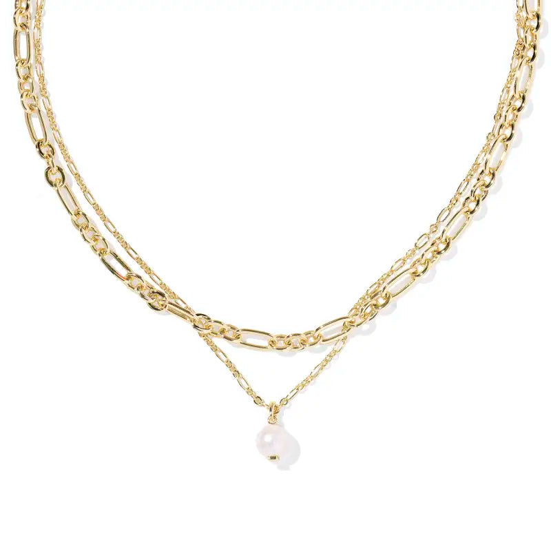 Gold chain necklace with a pearl pendant on a white background