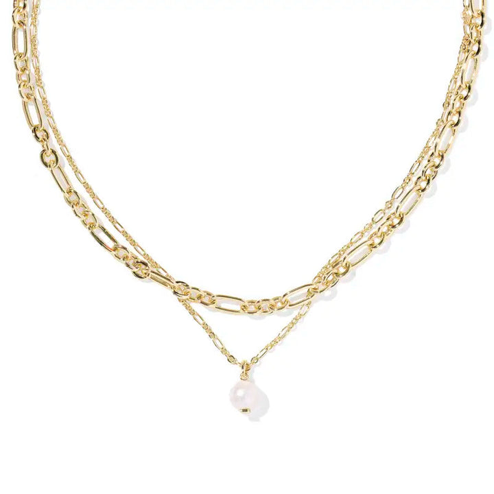 Gold chain necklace with a pearl pendant on a white background