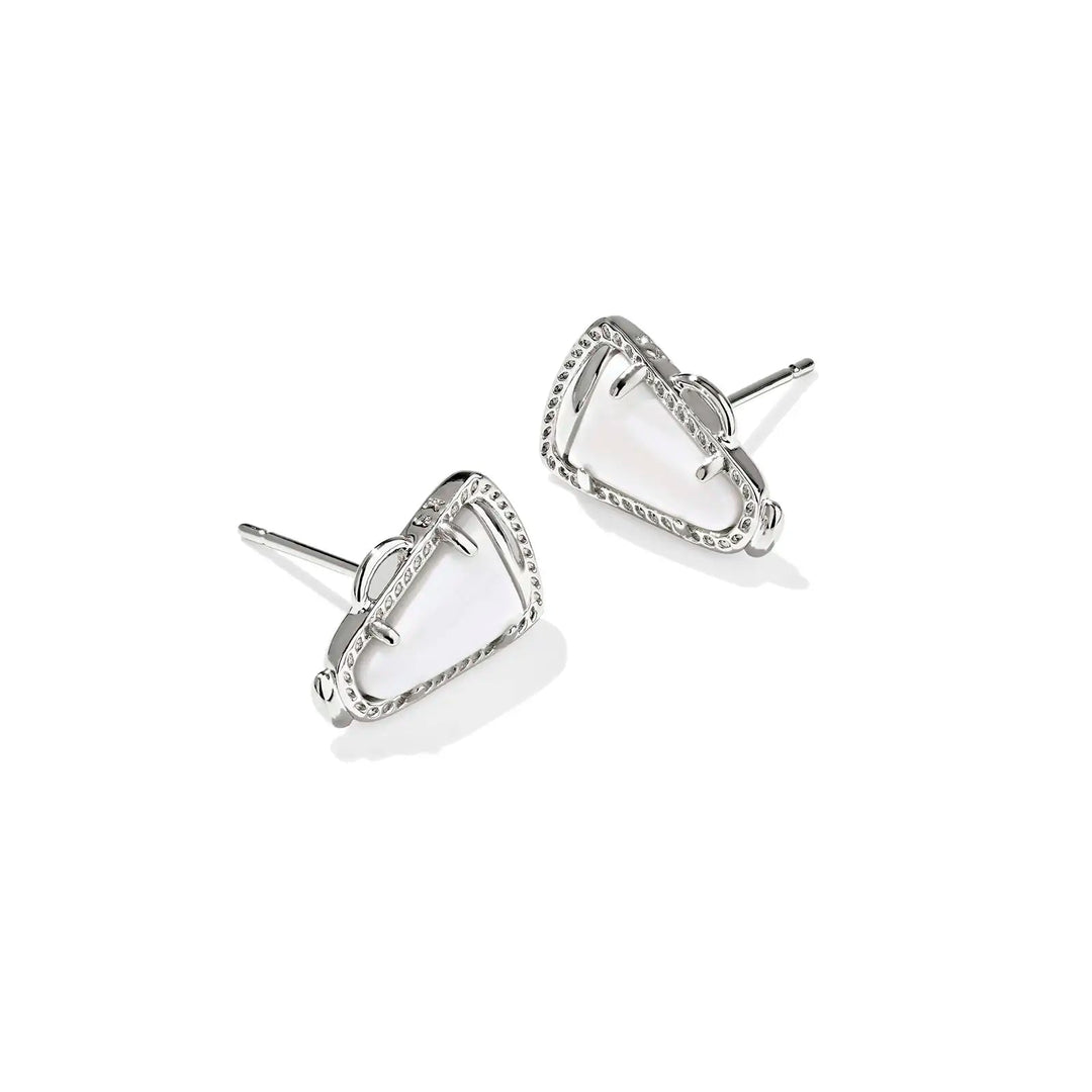 Pair of silver earrings with white gemstones on a white background
