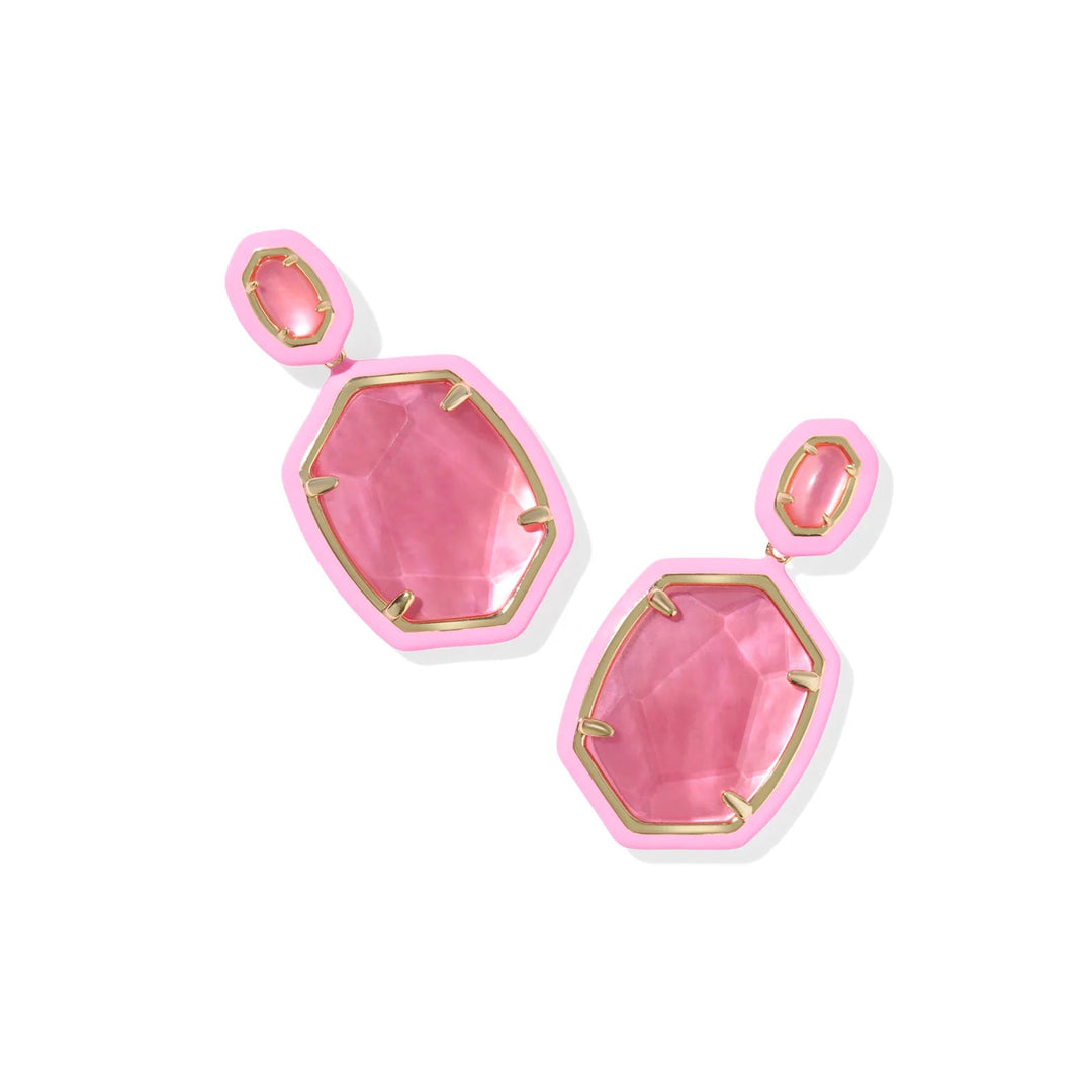 Pink earrings with gold accents on a white background
