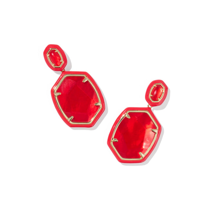 Red earrings with gold accents on a white background