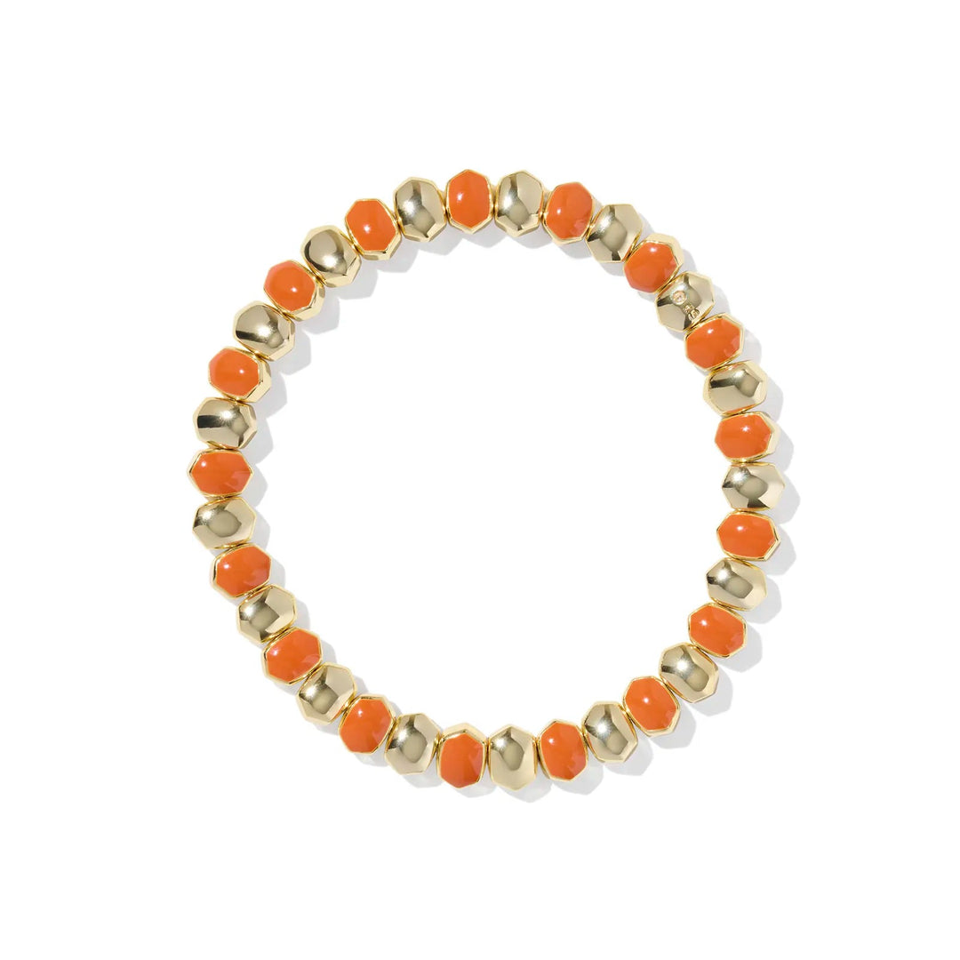 Bracelet with orange and gold beads on a white background