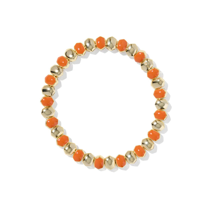 Bracelet with orange and gold beads on a white background