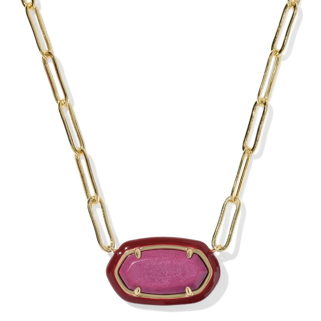 Necklace with a maroon pendant and gold chain on a white background