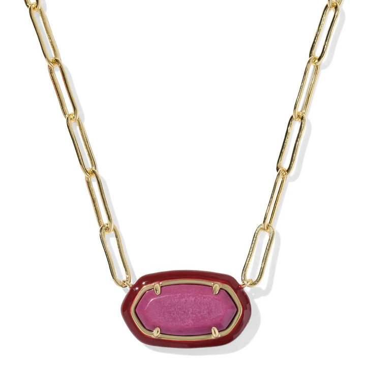 Necklace with a maroon pendant and gold chain on a white background
