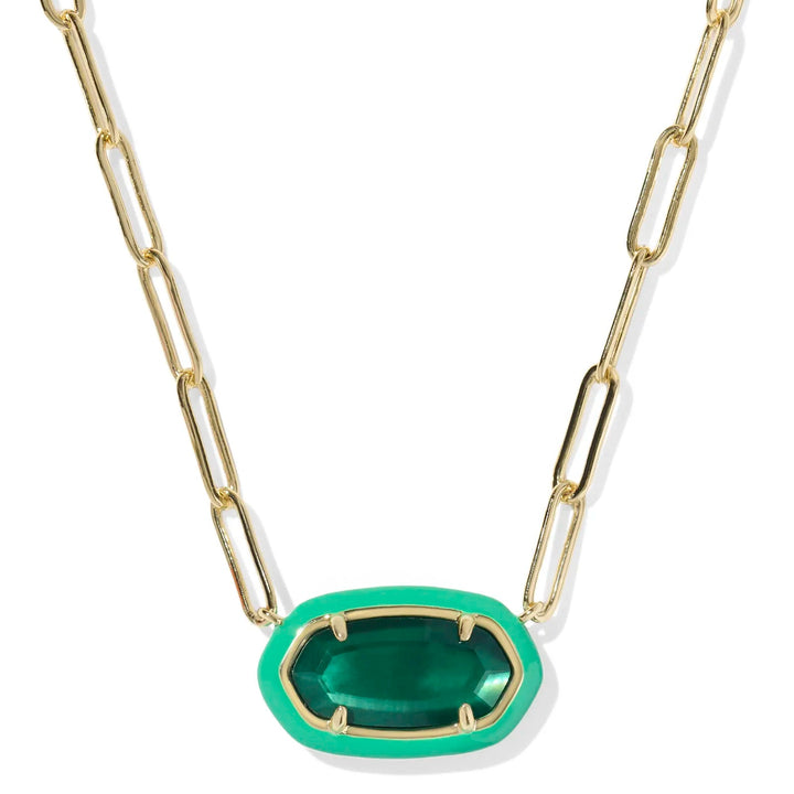Gold chain necklace with a green pendant on a white background