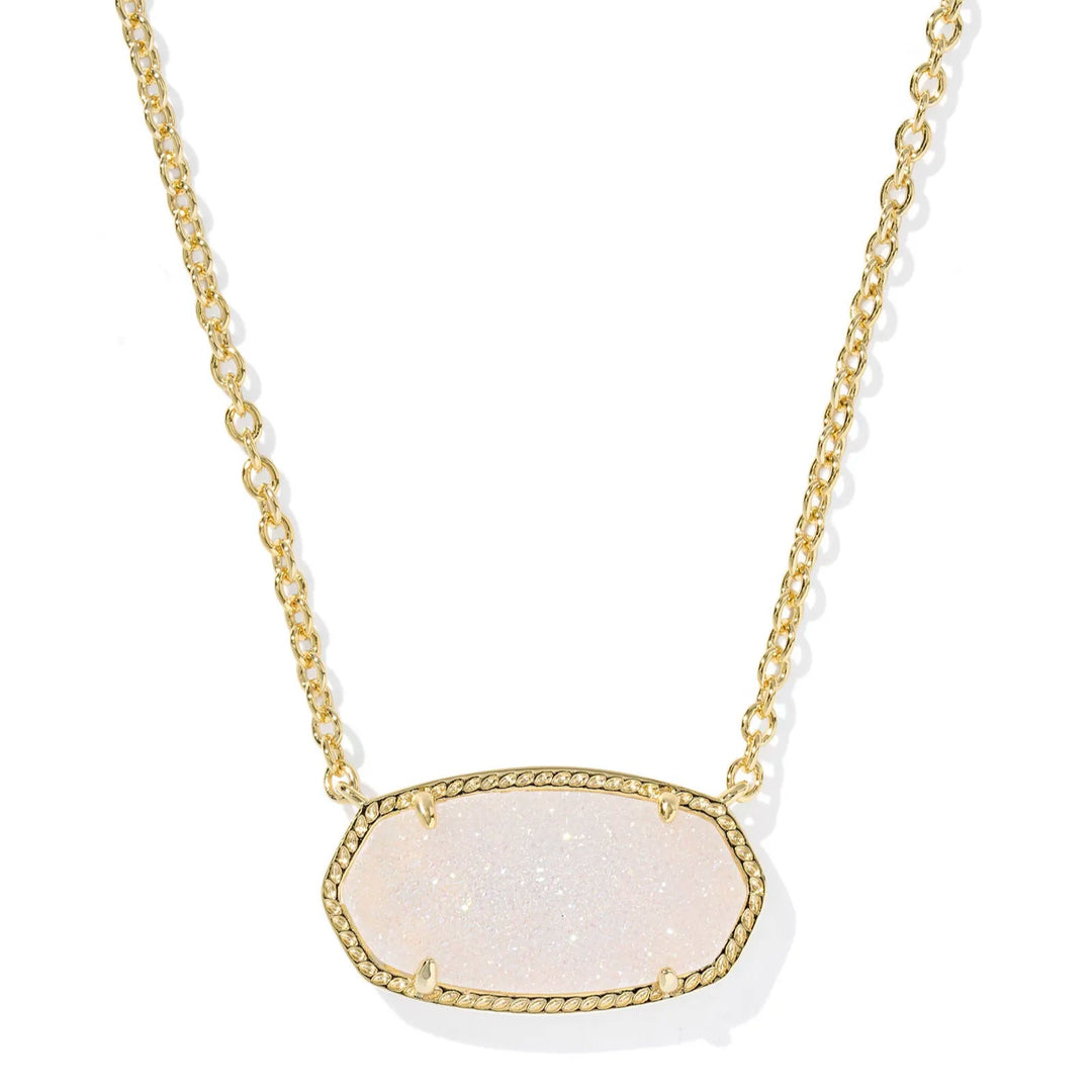 Necklace with a white iridescent drusy pendant on a gold chain against a white background