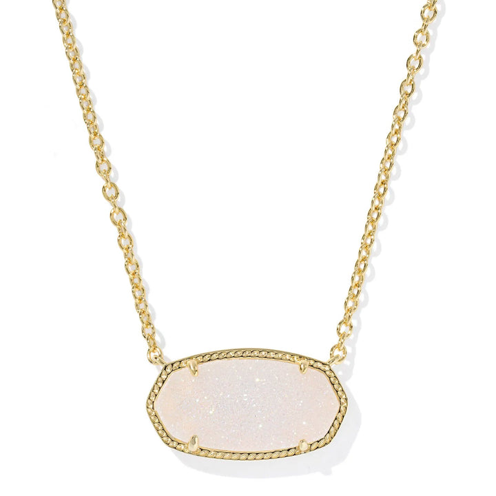 Necklace with a white iridescent drusy pendant on a gold chain against a white background