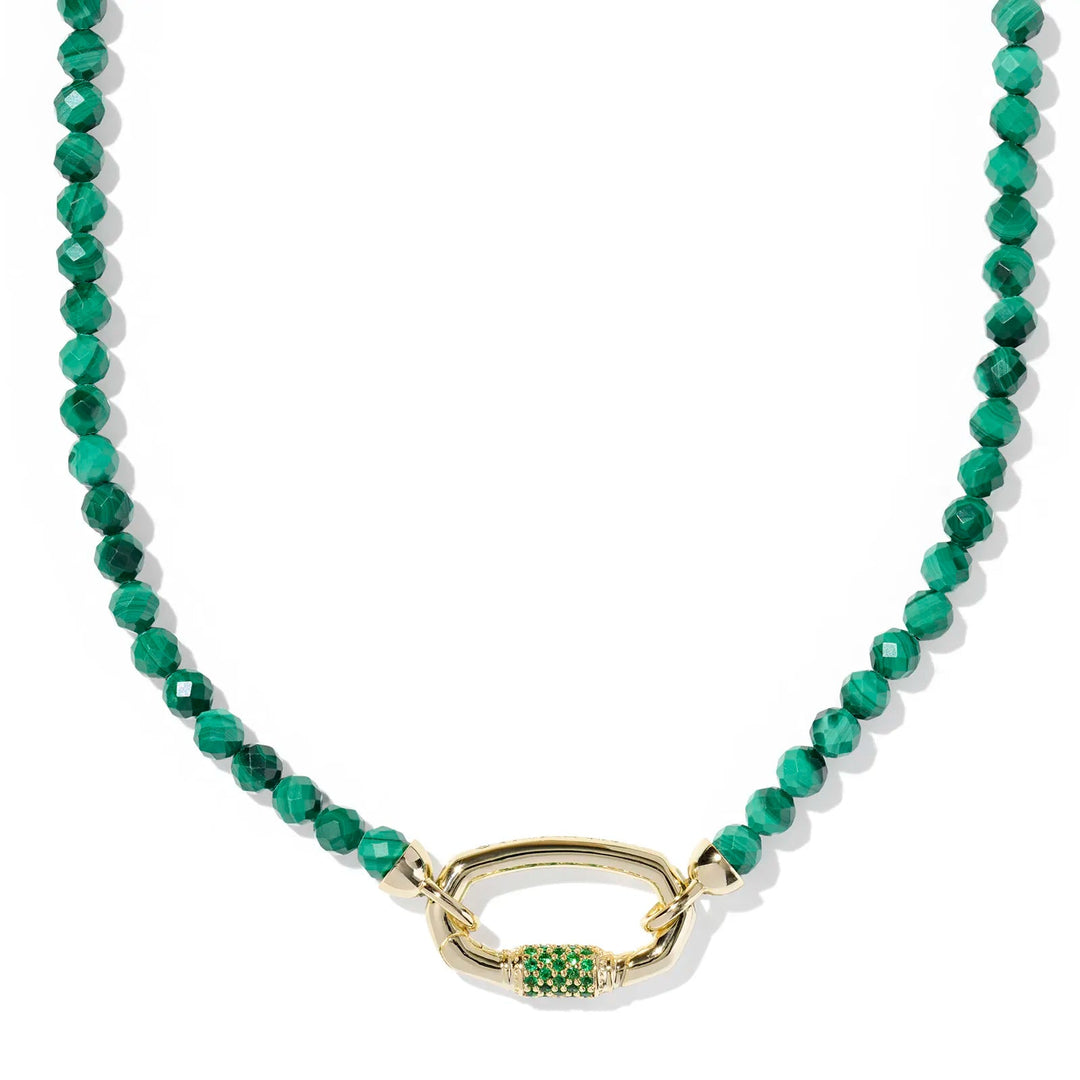 Green beaded necklace with a gold clasp on a white background