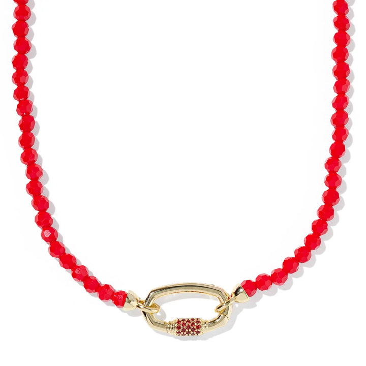 Necklace with red beads and a gold clasp on a white background