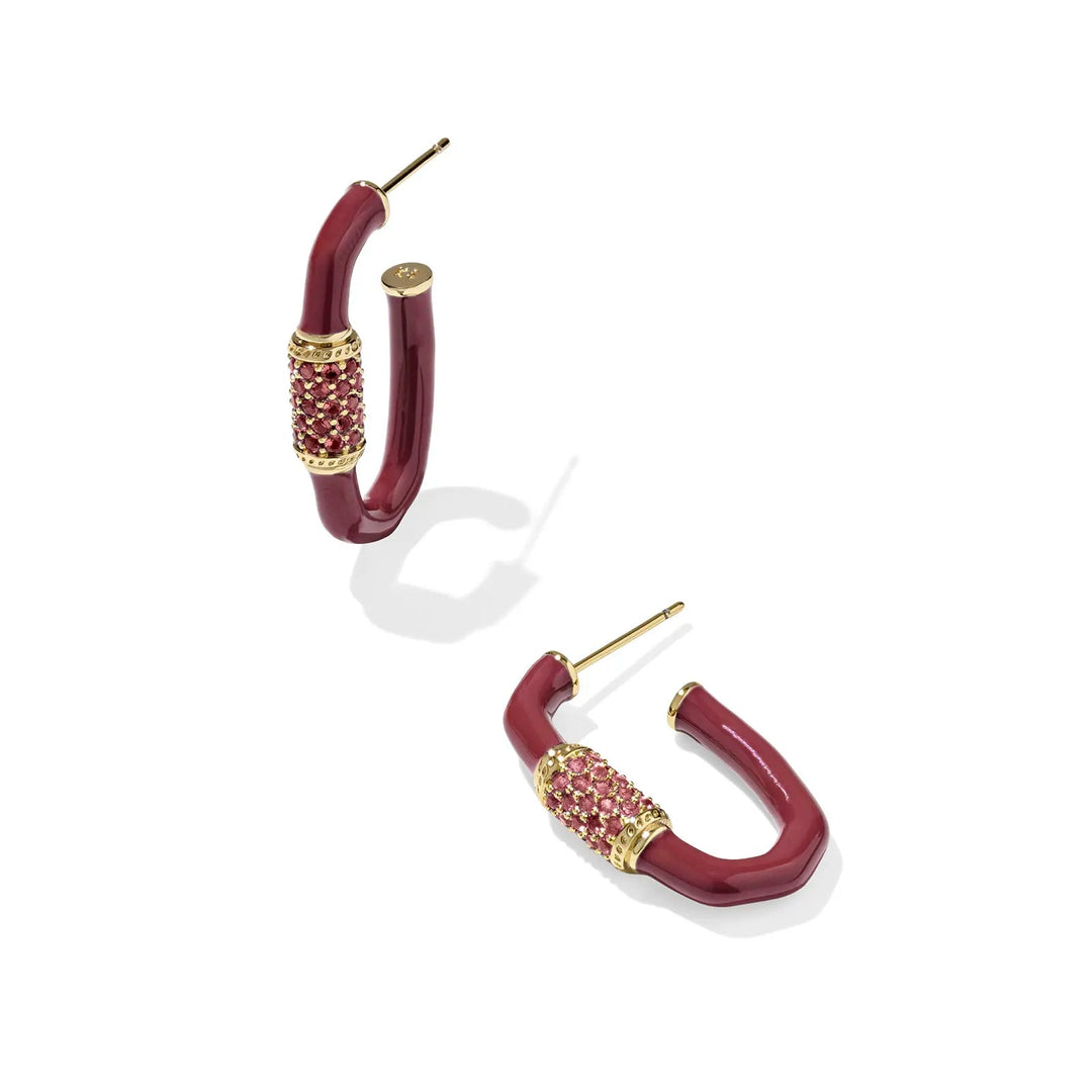 Pair of maroon hoop earrings with gold accents on a white background