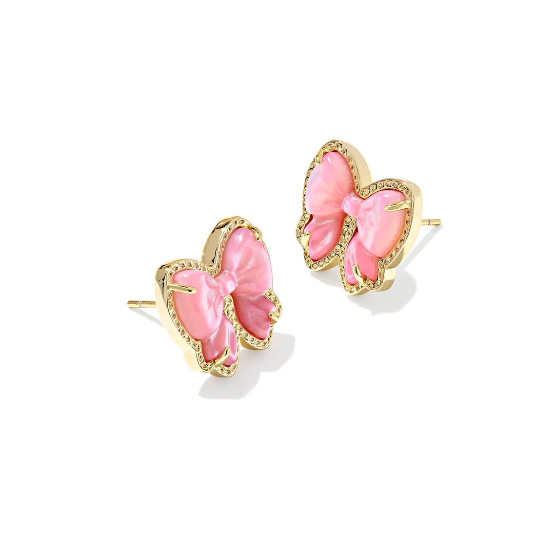 Pink bow earrings with gold accents on a white background