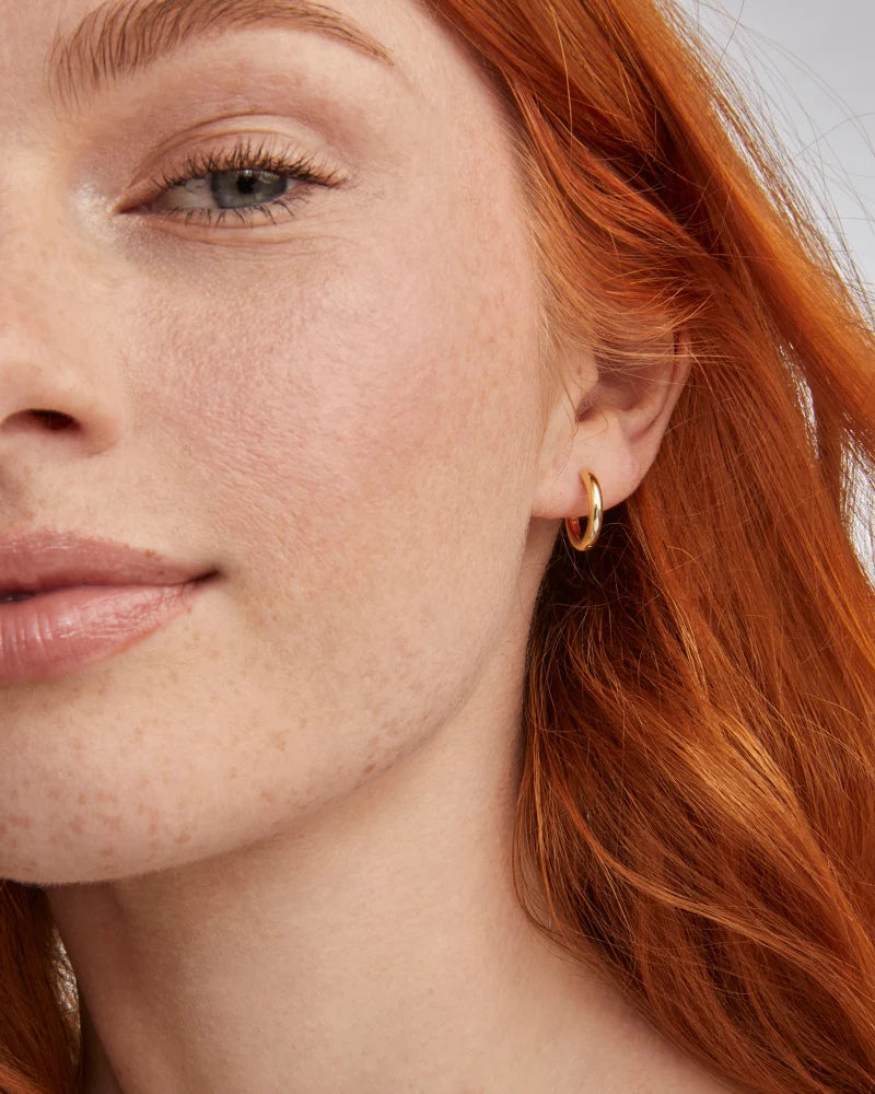 Kendra Scott | Hallie Gold Huggie Earrings in White Opalescent Resin