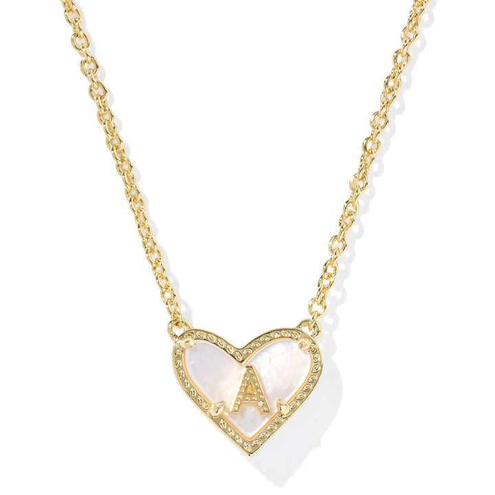 Gold necklace with a heart-shaped initial pendant on a white background