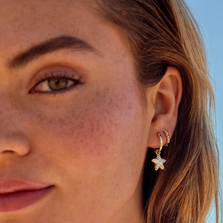 Kendra Scott | Jae Star Pave Gold Huggie Earrings in White Crystal - Giddy Up Glamour Boutique