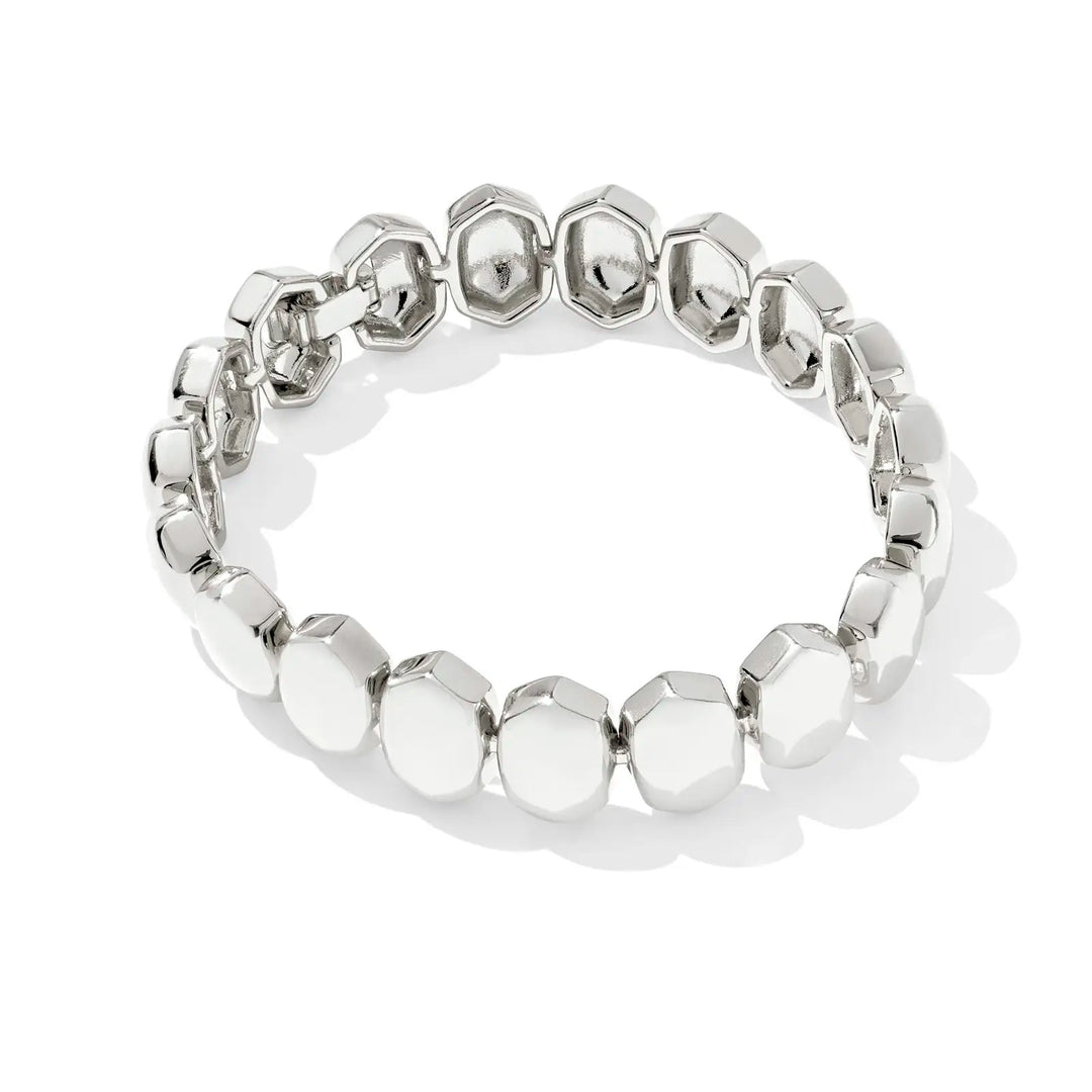 Silver bracelet with beaded design on a white background