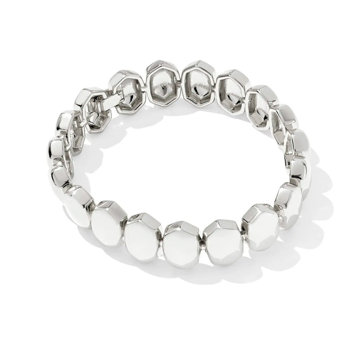 Silver bracelet with beaded design on a white background