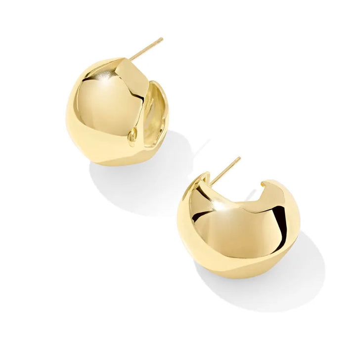 Gold hoop earrings on a white background