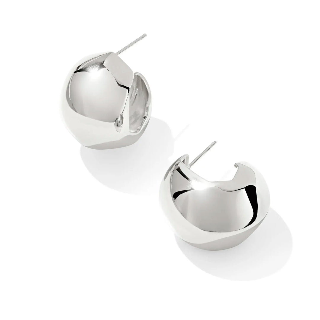 Pair of silver hoop earrings on a white background