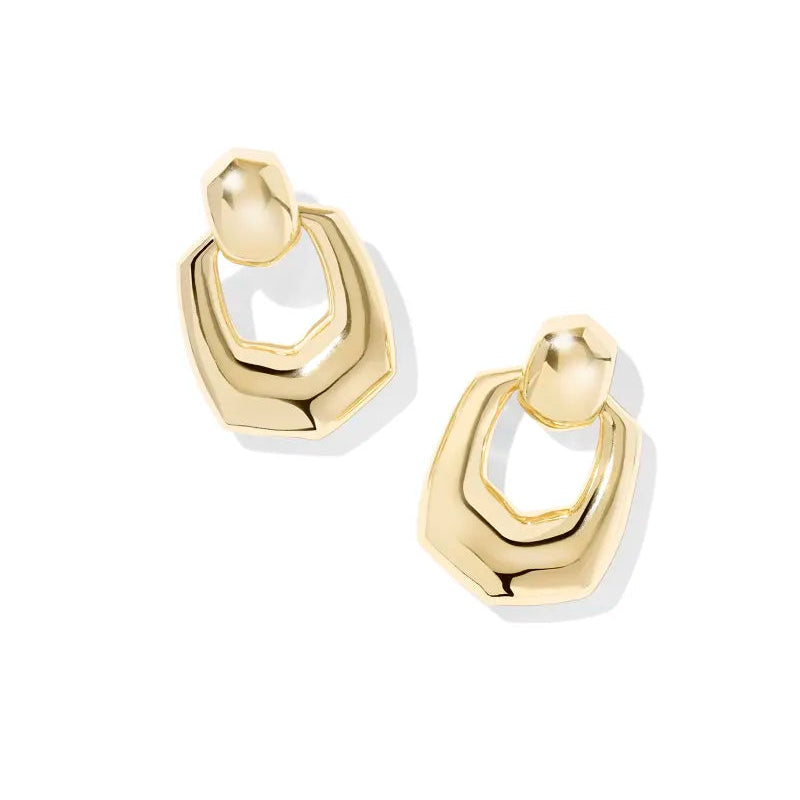 Gold hoop earrings on a white background