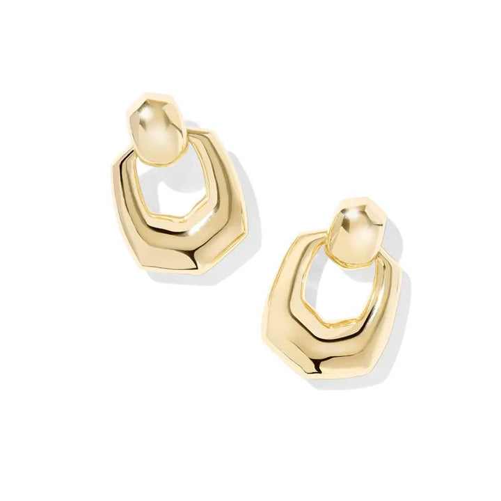 Gold hoop earrings on a white background