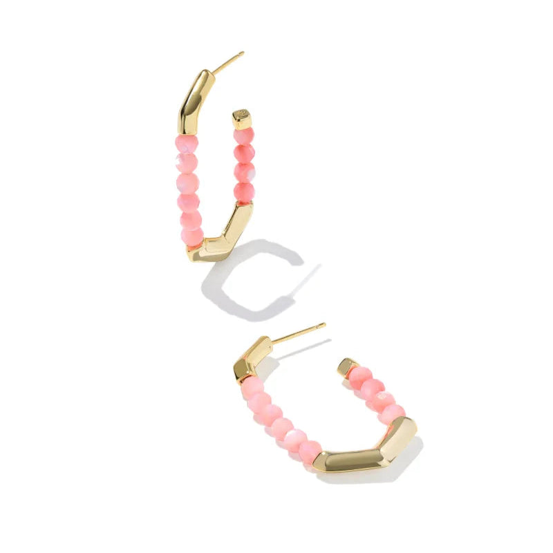 A solid white background with a hoop earring that is gold with 2 sections of Pink Chalcedony beads