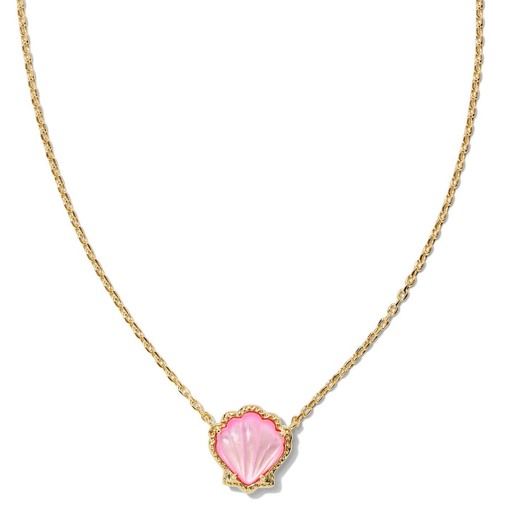 A solid white background with a gold necklace and shell pendant in blush mother of pearl.